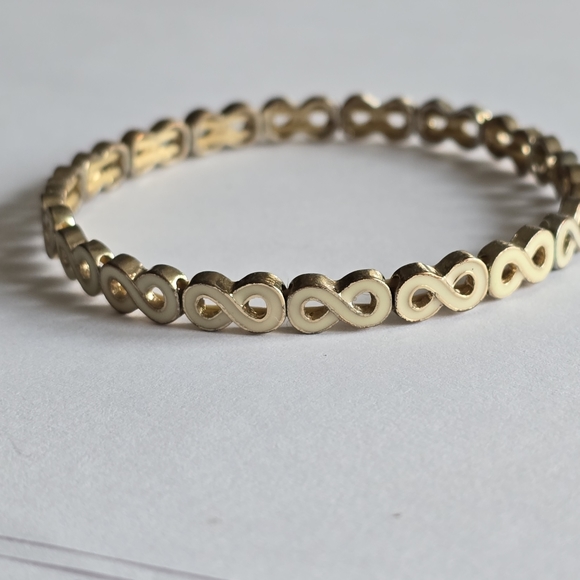 Infinity symbol bracelet stretch cream ivory colored enamel gold tone - Picture 10 of 11